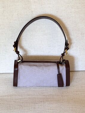 Gucci  Monogram GG lilac cloth and brown leather trim Shoulder bag